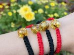 Vòng tay chỉ đỏ may mắn mix hổ phách Baltic tự nhiên
