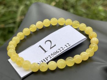 Vòng hổ phách tự nhiên màu vàng bơ VHP250622-12